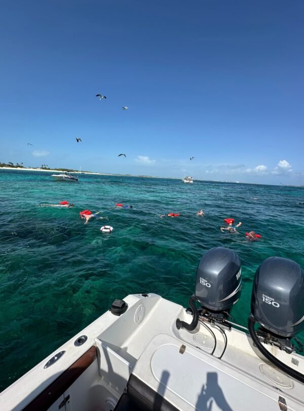 Reel Adventure Tours guests on a private boat trip in the Bahamas
