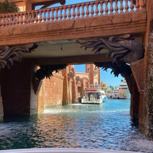 Cruising under the Atlantis bridge in Nassau Harbour