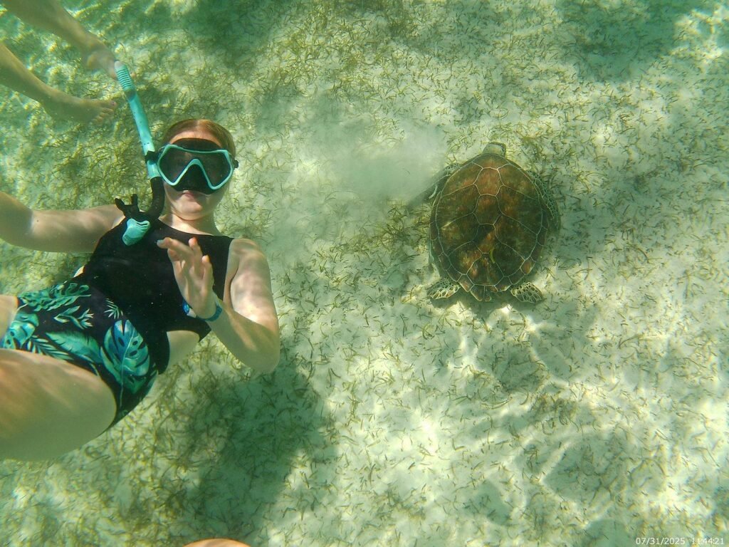 Guests aboard a Reel Adventure Tours private charter in Nassau